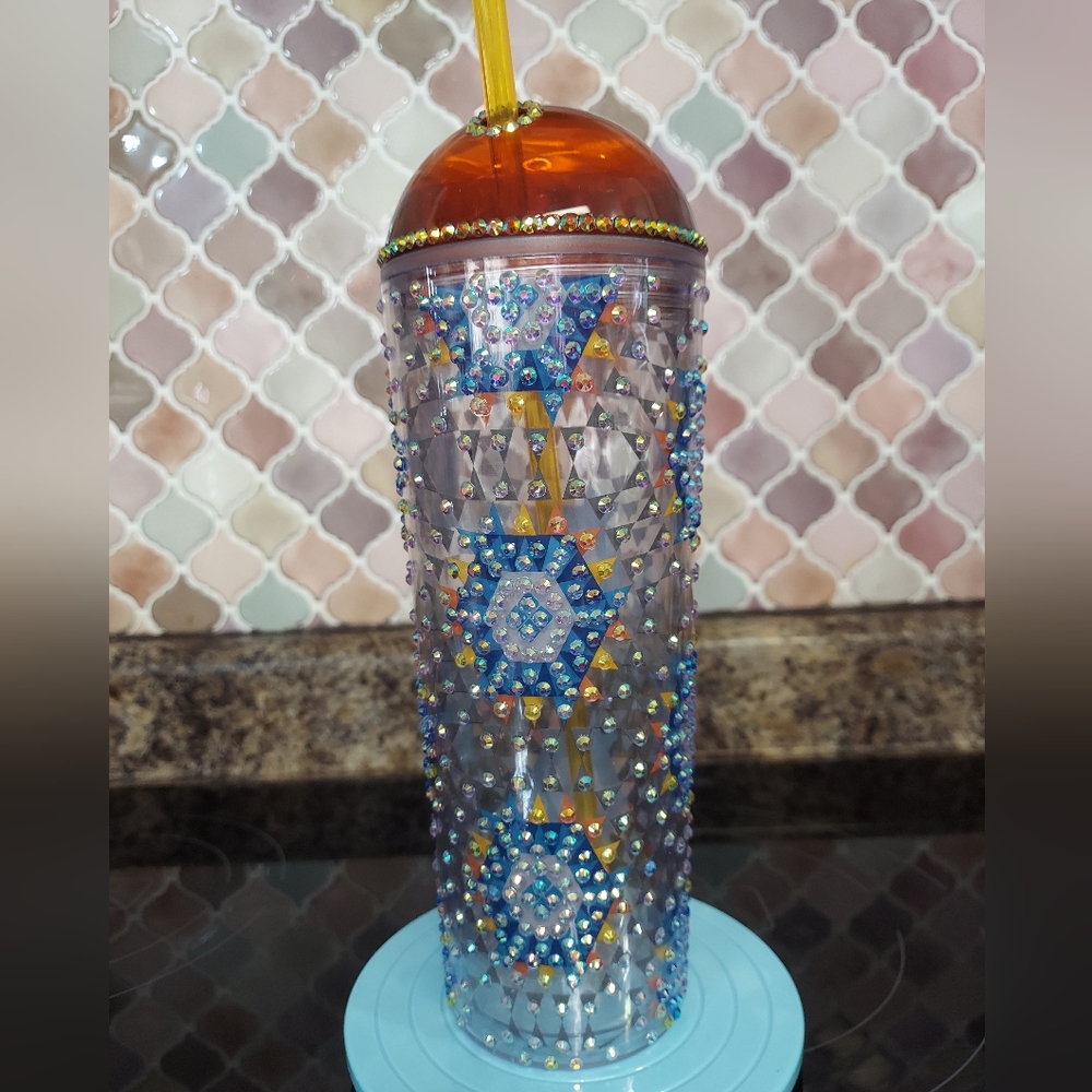 Caribou Coffee tumbler w/ dome lid